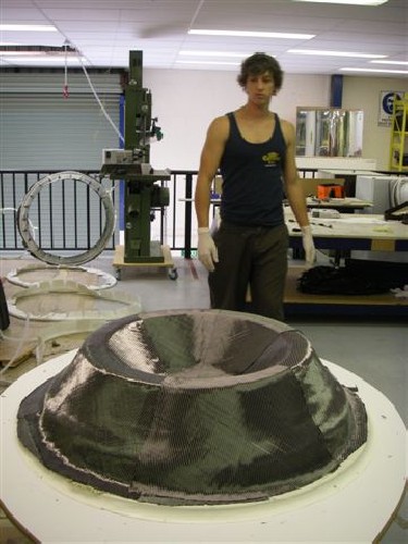 Carbon fibre cloth wrapped around the rim ready for infusing