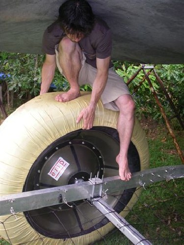 Chris testing to see how the new carbon/kevlar rims made my EMP flex under load