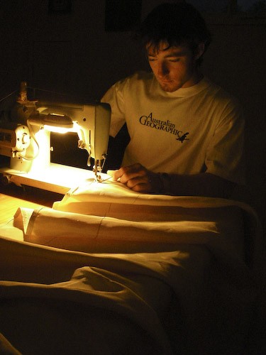 Chris sewing Kevlar covers for PAC2 tyres