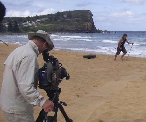 Clark being filmed by Discovery Channel pulling the truck tyre for training