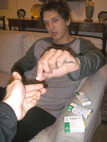 Tranadol Party! Clark passing me a Tranadol tablet to test for reactions - Click for full-size.