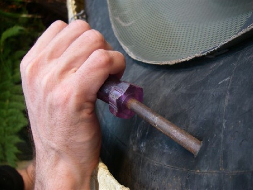 Stabbing PAC2 tire with screwdriver