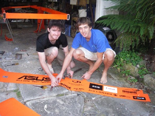 Chris and Clark working on sponsor logo banner