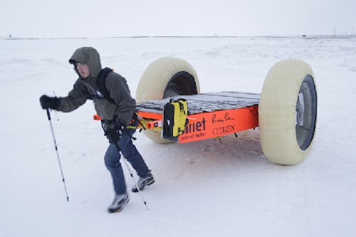 Chris hauling the PAC outside the hanger at Cambridge Bay