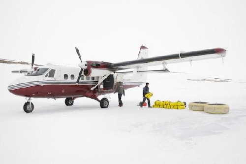 Twin otter landed us on frozen lake