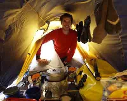 Clark cooking up a storm in the argh.. foyer of the tent