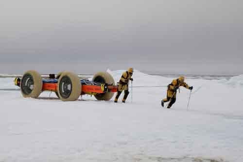 Hauling dog team style over the frozen pack ice
