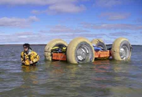 Chris effortlessly wading the weightless PAC across a lake - Click for full-size.