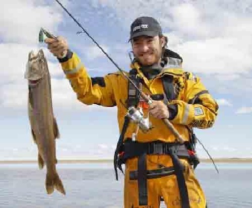 Chris holding up a 63 cm, 2.5kg Lake Trout - A.K.A. Dinner.