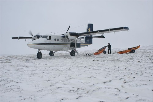 Twin Otter plane beside out PACs ready to pick us up