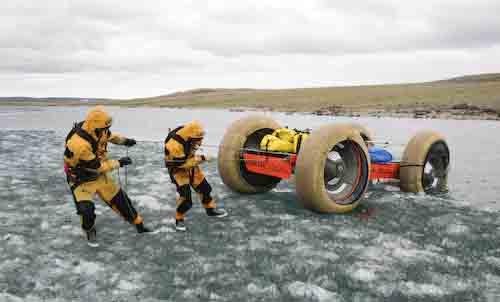 Pulling HMAS Nugget out of the water and up onto the floating ice