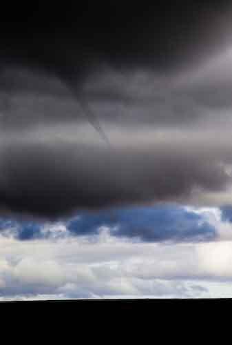 Twister in the clouds, followed by hail and heavy rain
