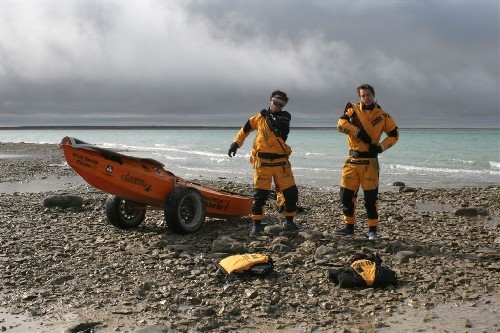 Putting on our Gore-Tex&reg drysuits before converting PACs to kayak mode and paddling across lake