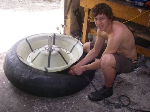 Clark pumping up the tire on the test rims